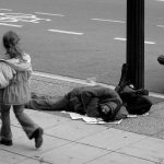 Man_sleeping_on_Canadian_sidewalk