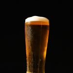 clear drinking glass with beer